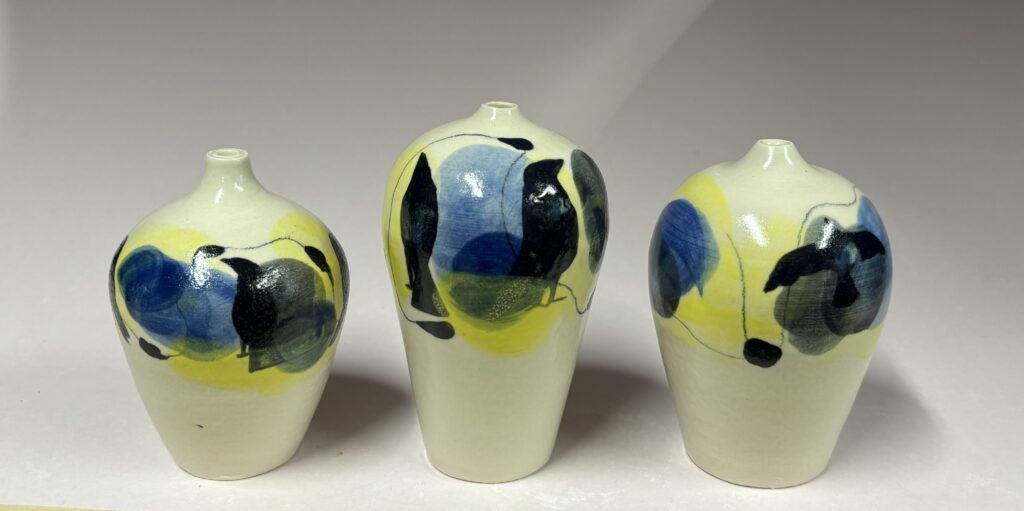 Small raven vase blue and yellow